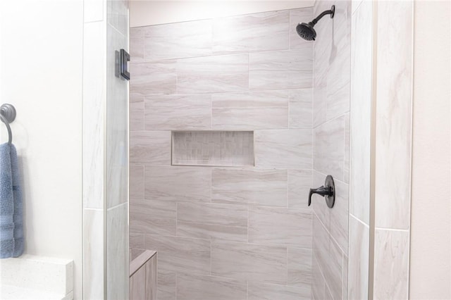 bathroom featuring a shower stall