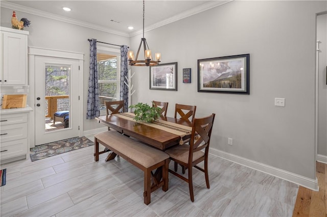 dining area featuring visible vents, a notable chandelier, recessed lighting, crown molding, and baseboards