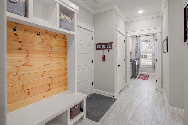 mudroom featuring recessed lighting, baseboards, and ornamental molding