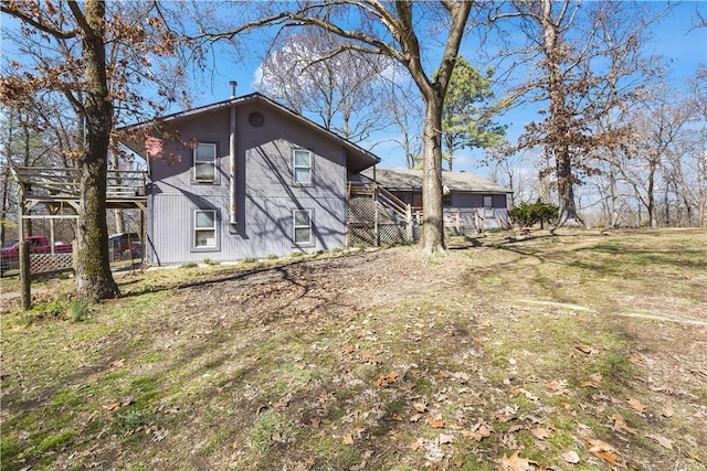 exterior space featuring a wooden deck