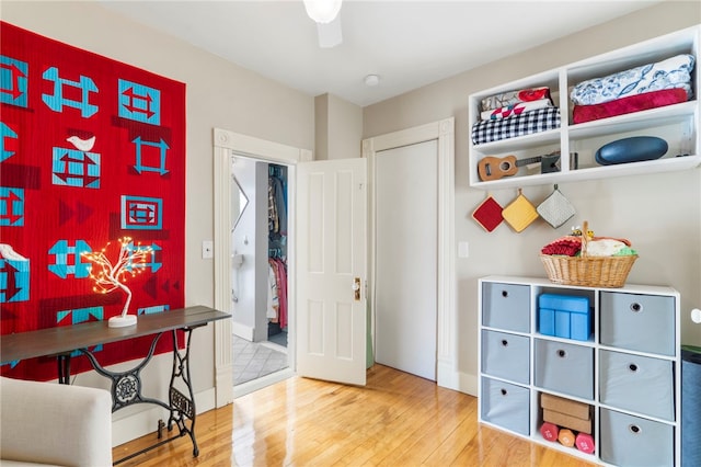 rec room featuring wood finished floors