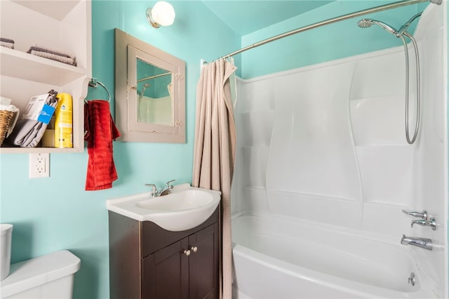 full bath featuring vanity, shower / tub combo, and toilet