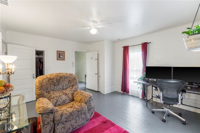 office area with ceiling fan, visible vents, ornamental molding, and wood finished floors