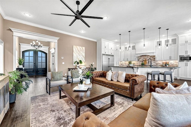 living room with recessed lighting, french doors, dark wood-style flooring, and crown molding