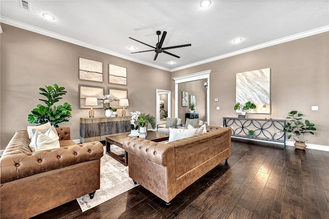 living room with ornamental molding, baseboards, and hardwood / wood-style floors