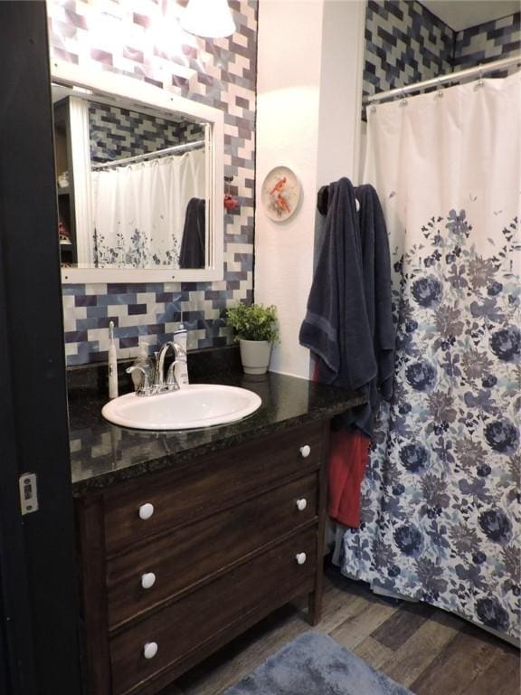 1820 Oak Grove Rd, Van Buren, AR 72956 - bathroom featuring vanity, a shower with shower curtain, and wood finished floors