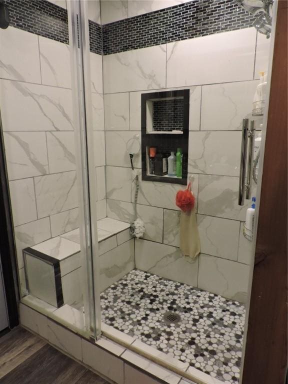 1820 Oak Grove Rd, Van Buren, AR 72956 - bathroom featuring wood finished floors and a stall shower