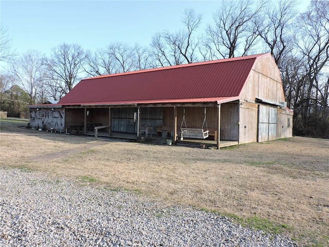 1820 Oak Grove Rd, Van Buren, AR 72956 - view of front facade with metal roof, a gambrel roof, an outbuilding, and a barn