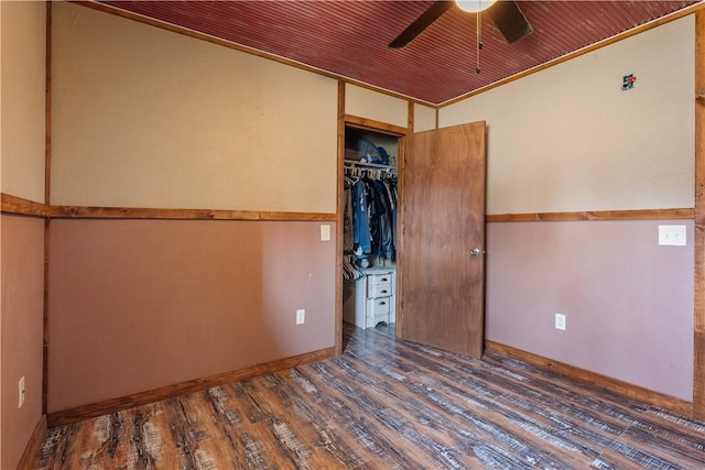 unfurnished bedroom featuring a closet, ceiling fan, and wood finished floors