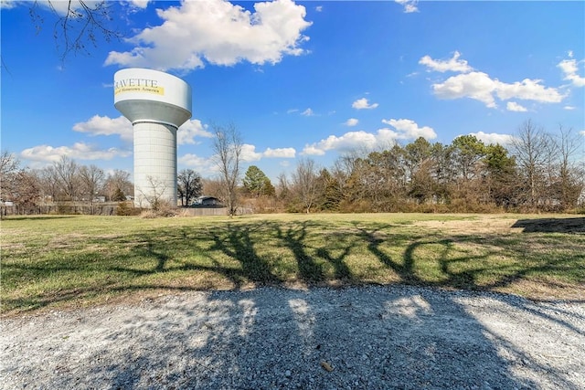 surrounding community with a yard