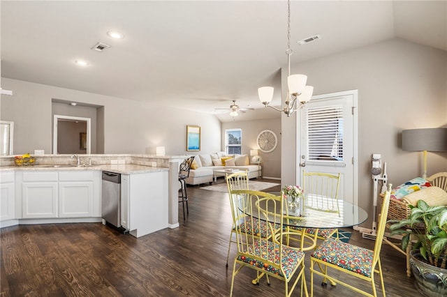 dining area with recessed lighting, visible vents, lofted ceiling, and dark wood finished floors