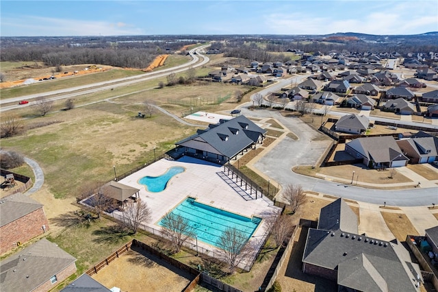 birds eye view of property with a residential view