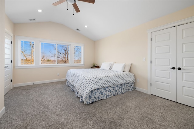 bedroom featuring visible vents, carpet flooring, baseboards, and lofted ceiling