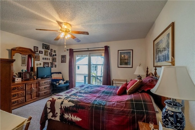 bedroom with carpet flooring, a textured ceiling, a ceiling fan, and access to outside