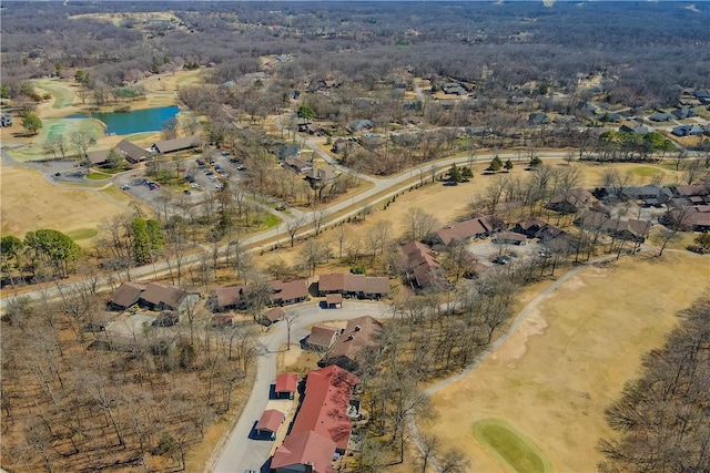 birds eye view of property with a water view and a residential view