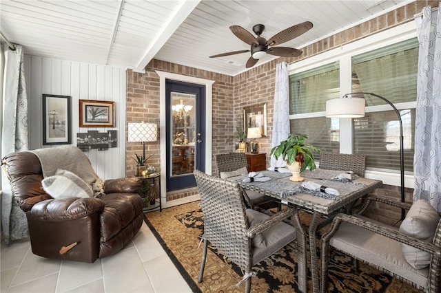 interior space featuring outdoor dining area and a ceiling fan