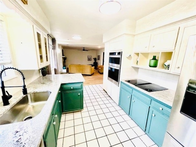 kitchen featuring open shelves, a sink, white cabinetry, double oven, and black electric stovetop