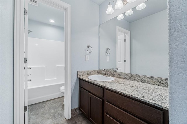 full bathroom featuring visible vents, toilet, vanity, and shower / bath combination