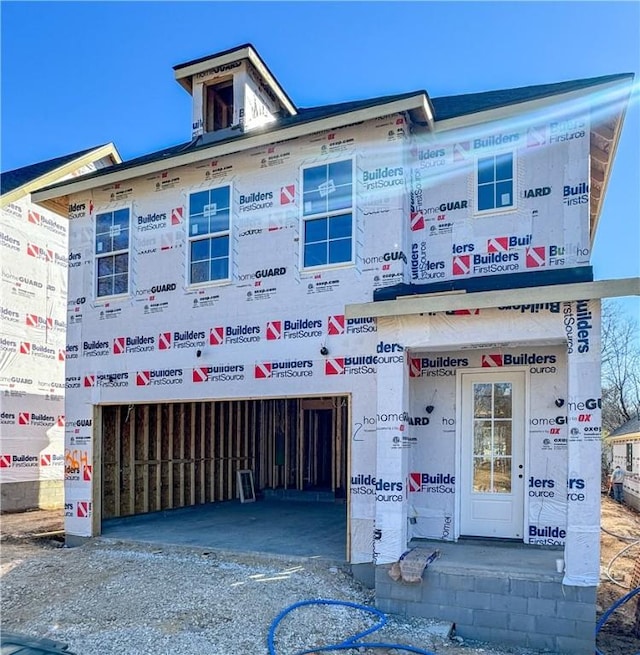 view of property with a garage