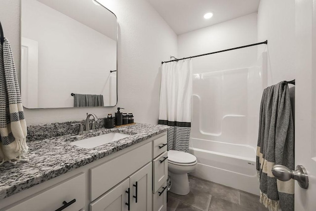 bathroom with recessed lighting, toilet, vanity, and shower / tub combo