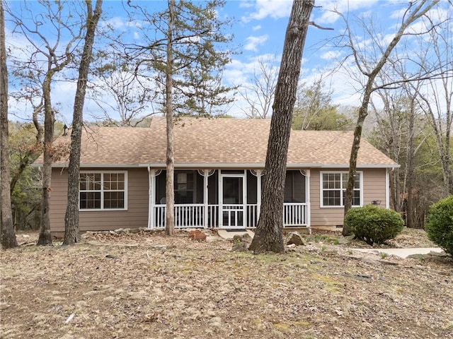 ranch-style home with crawl space and a shingled roof