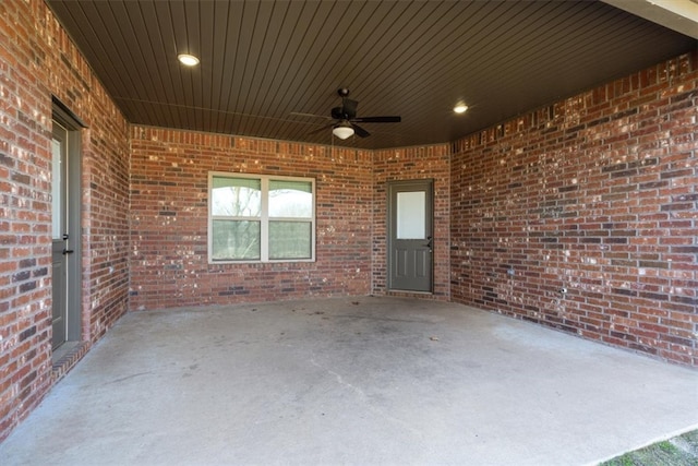 view of patio featuring ceiling fan