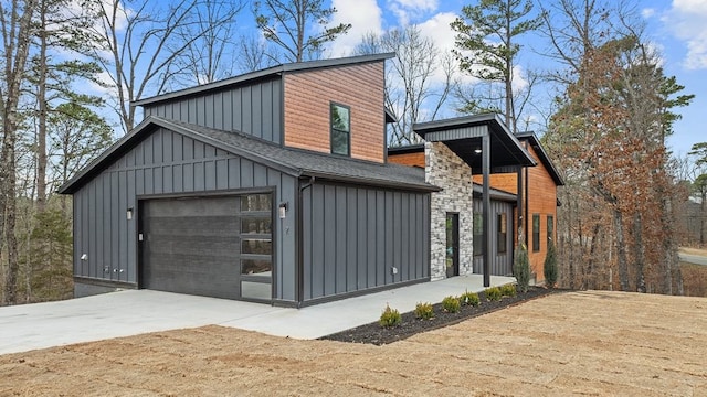 exterior space with concrete driveway