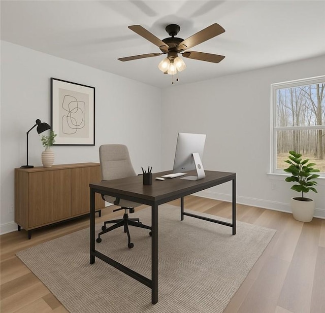 4 Stobo Ln, Bella Vista, AR 72715 - office area with light wood-style floors, a ceiling fan, and baseboards