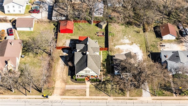 birds eye view of property with a residential view