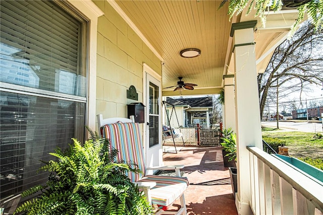 view of patio / terrace with a porch and a ceiling fan