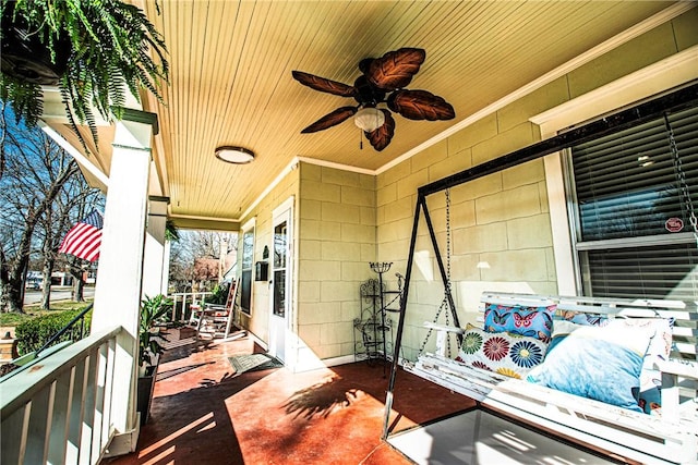 view of patio / terrace with a porch and a ceiling fan