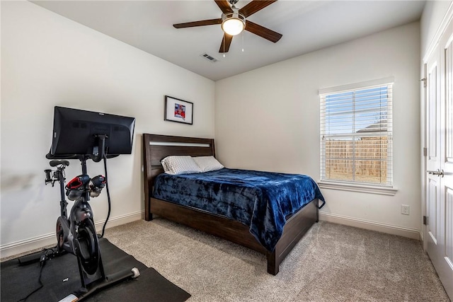 bedroom featuring visible vents, ceiling fan, baseboards, and carpet floors