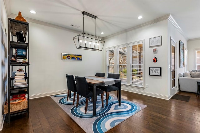 dining space featuring visible vents, crown molding, baseboards, dark wood finished floors, and recessed lighting