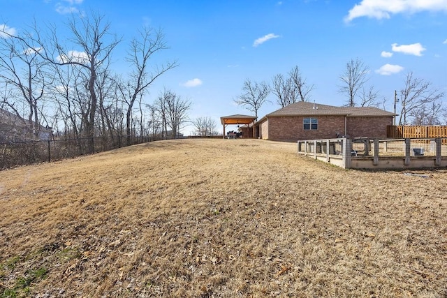 view of yard with fence