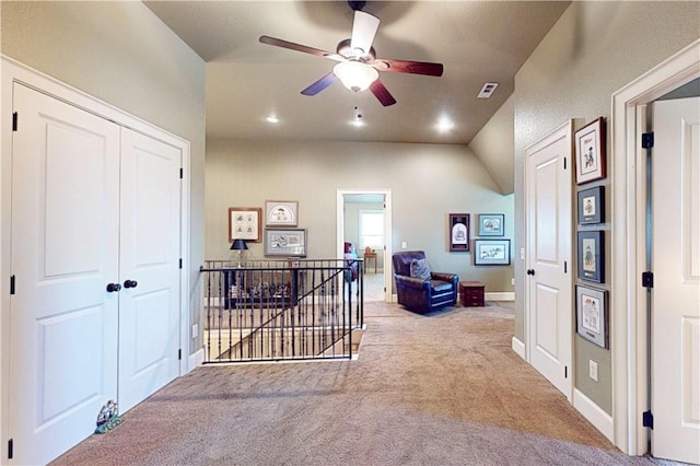 interior space with visible vents, an upstairs landing, recessed lighting, carpet, and baseboards