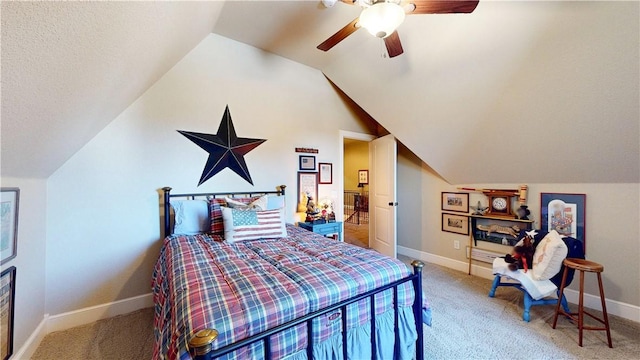 bedroom with baseboards, lofted ceiling, light carpet, and a ceiling fan