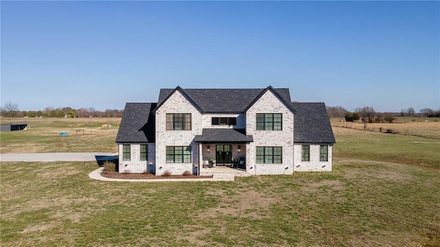 view of front of house featuring a front lawn