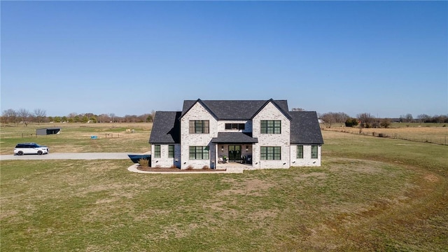 view of front of property with a front lawn