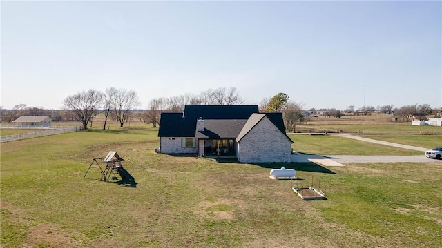 exterior space with a rural view