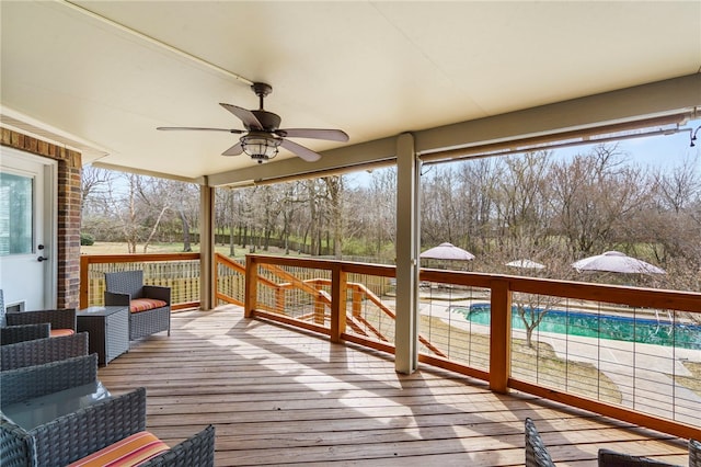 wooden terrace with ceiling fan