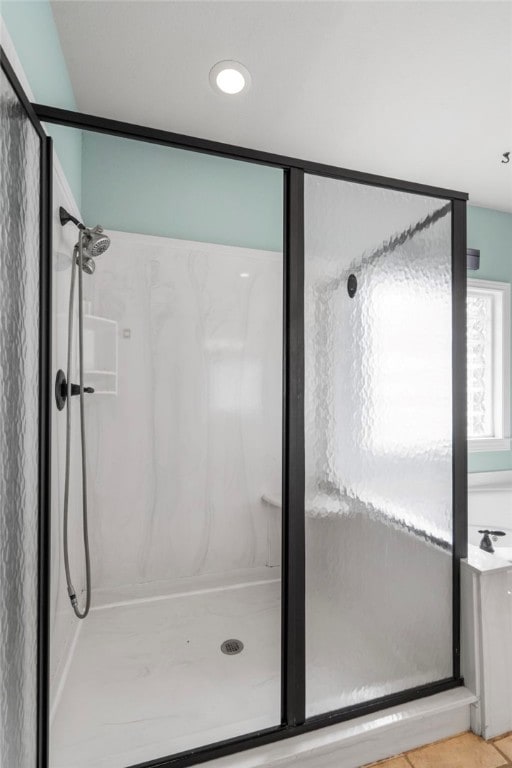 bathroom featuring a stall shower