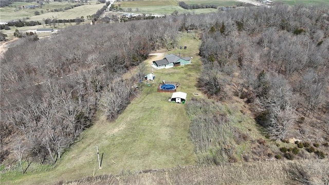 birds eye view of property featuring a rural view