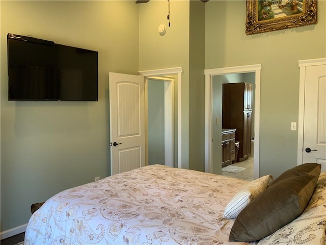 bedroom featuring a high ceiling