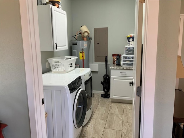 washroom featuring electric water heater, electric panel, cabinet space, marble finish floor, and separate washer and dryer