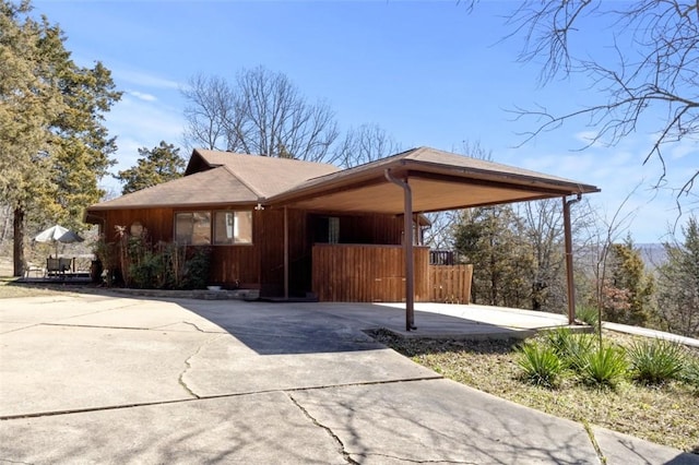 exterior space featuring an attached carport