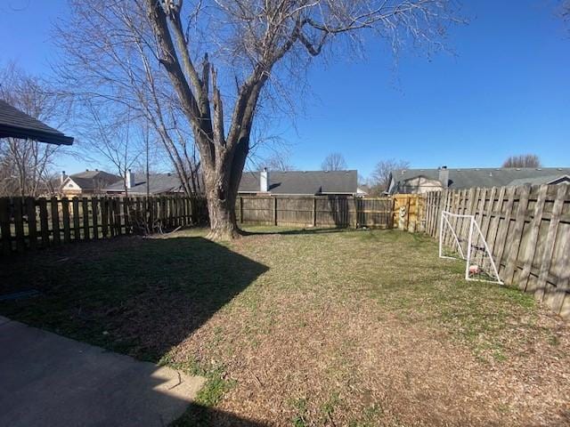 view of yard featuring a fenced backyard