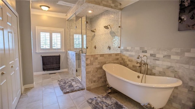 19 Razorback Rd, Rogers, AR 72758 - bathroom with a shower stall, ornamental molding, tile walls, wainscoting, and a soaking tub