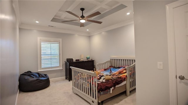 carpeted bedroom featuring visible vents, baseboards, coffered ceiling, and crown molding