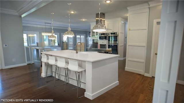 19 Razorback Rd, Rogers, AR 72758 - kitchen featuring white cabinets, a kitchen island with sink, a sink, stainless steel double oven, and crown molding