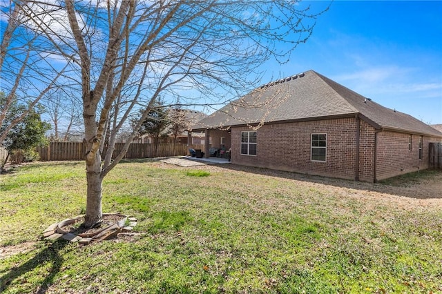 view of yard featuring a patio and a fenced backyard